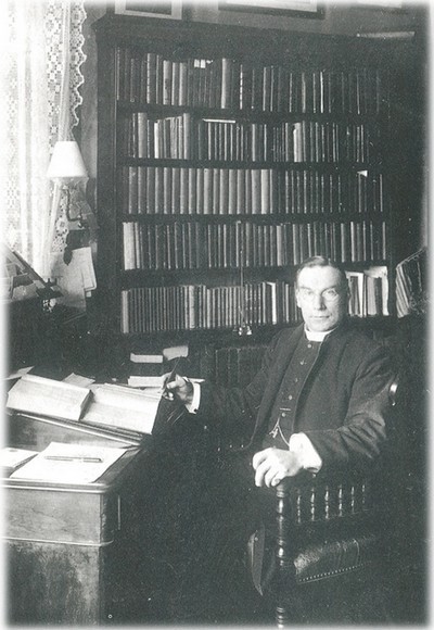 William Challacombe in his study
