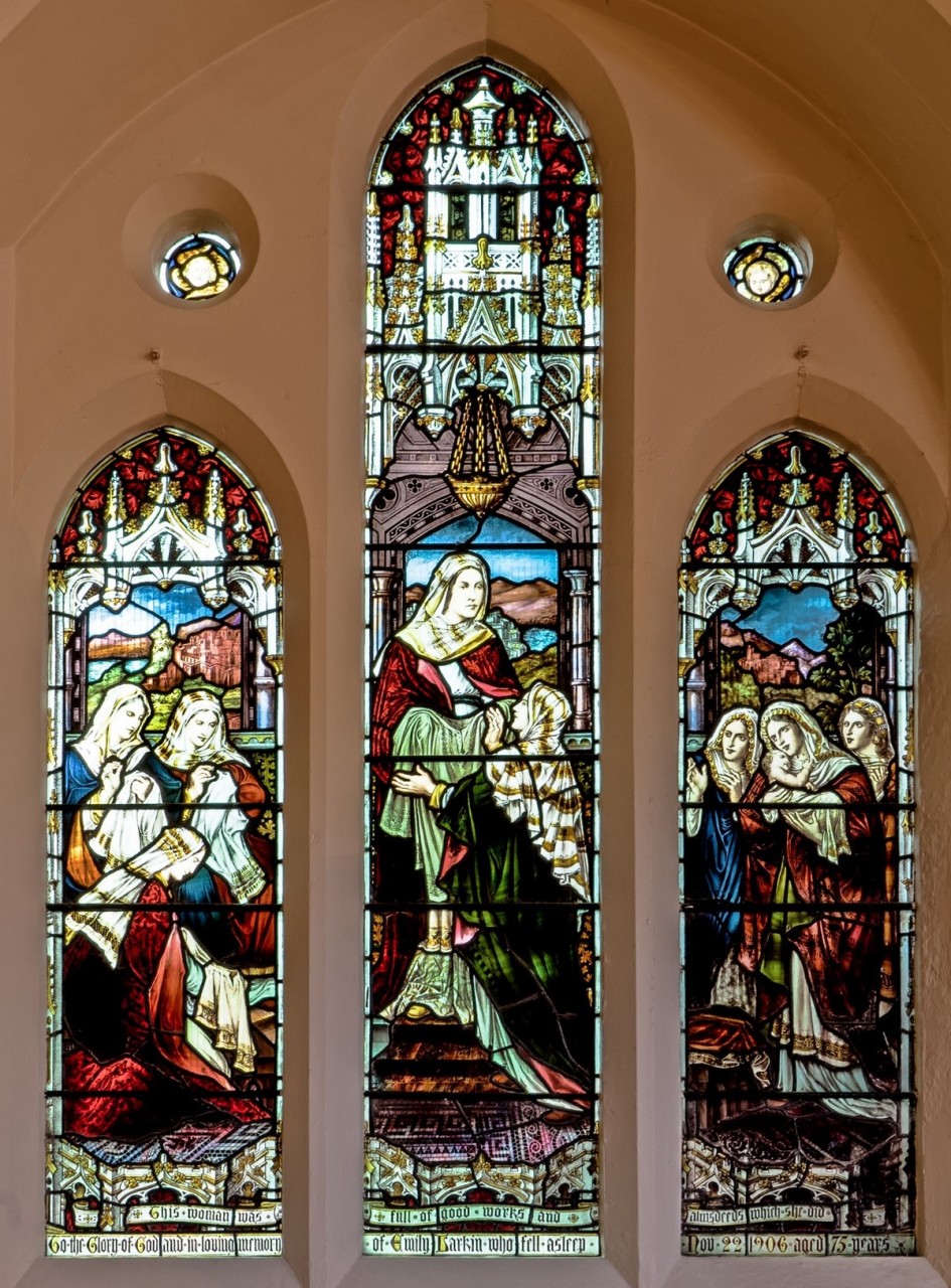 Photo of the stained glass window depicting the the biblical character Tabitha (or Dorcas)