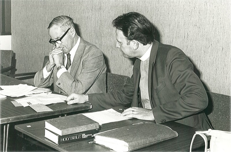 John Short talking to churchwarden Ian Young at a PCC meeting
