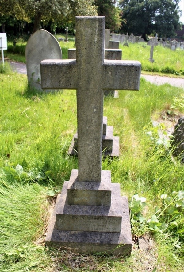 Photo of Emily Larkin's gravestone, in the form of the cross