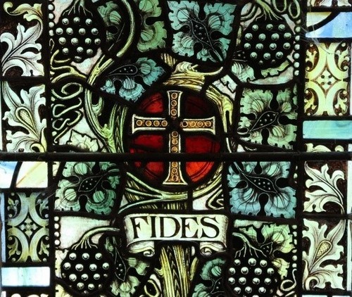 Close-up of the depiction of 'Fides'; above the words is a bejewelled cross at the centre of a vine bearing bunches of grapes