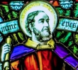 Close-up of the Simeon and Anna window, showing the head of the bearded James Page (as if from a black and white photo) superimposed on the body of Simeon