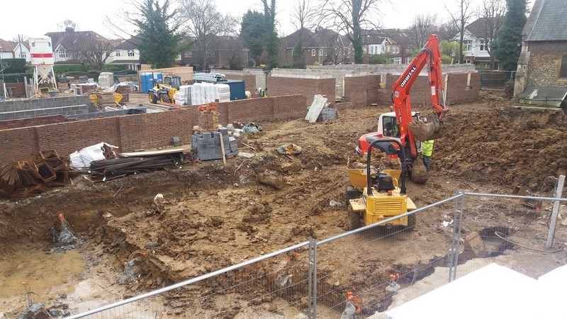 Photo looking down on the building site after clearance of the rubble and work is about to start to lay the foundations for the New Hall