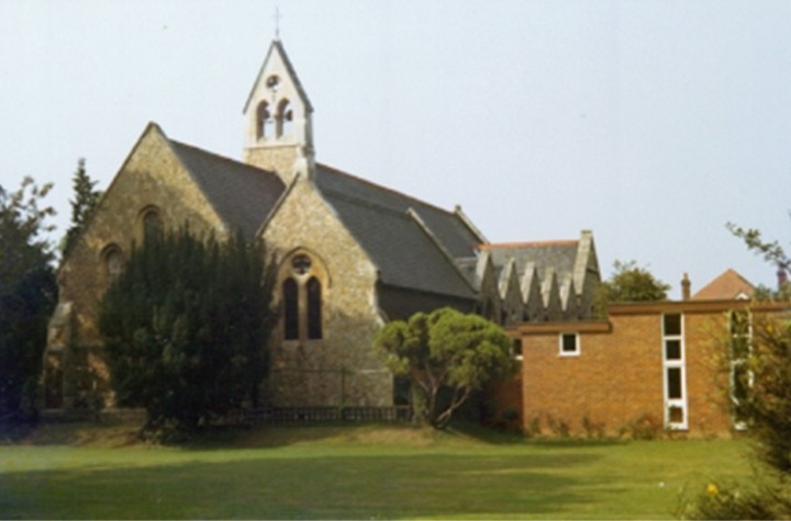 Photo of the church from 1966 showing its east wall; the tree obscures all but the top part of the window